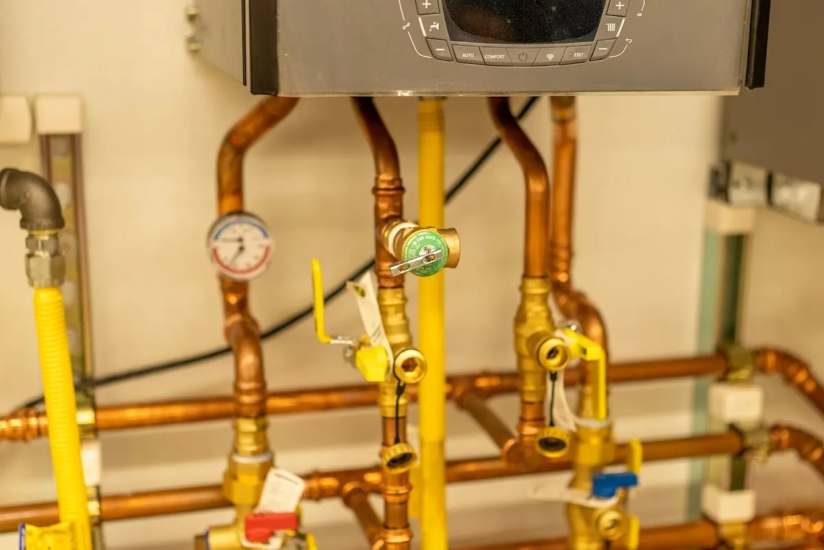 Licensed technician providing Water Heater Installation for a homeowner in Mills